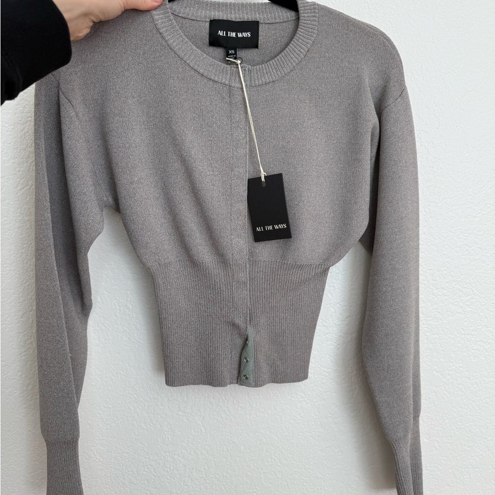 Gray cardigan. With tags. Never worn